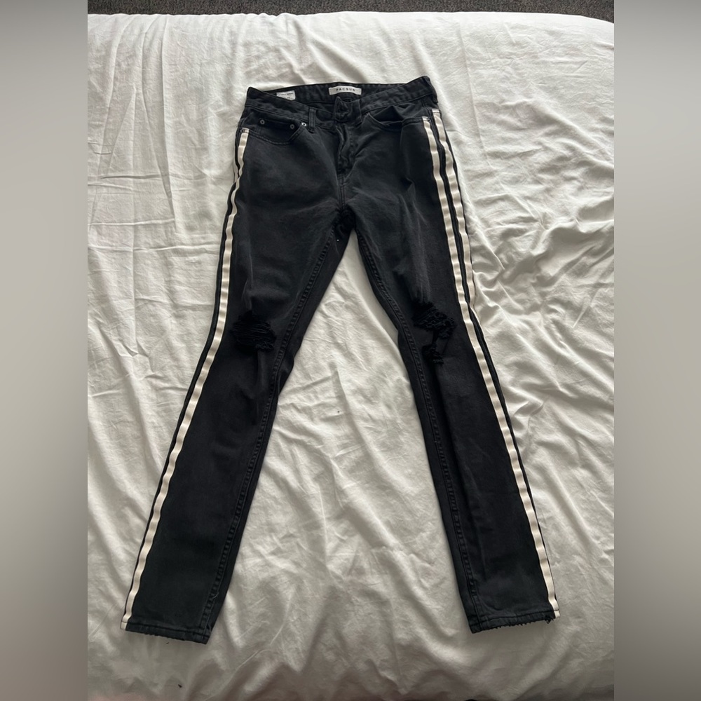 Pacsun black ripped jeans with white stripes